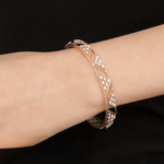 Twisted Ribbon Diamond Studded Openwork Bangle - Image 4
